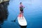 SUP Stand up paddle board woman paddleboarding