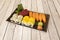 Super assorted sushi tray with Norwegian salmon nigiri, red tuna sashimi,