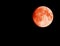 Super blood moon on dark background