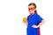 super child in mask and cloak holding orange and smiling at camera