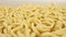 Super close details of dry instant noodles. background texture