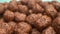 Super closeup details. breakfast cereals in the form of chocolate corn balls .