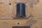 Super cool shutters in Italy, warm tones, worm, vintage exterior. All authentic.