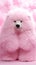 super fluffy pink ice polar bear looking directly at the camera with a soft background