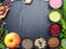 Super food health food selection in bowls, spirulina, berry powder, black cumin, pumpkin and sunflower seeds, sesame, flex seeds,