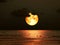 super full blood moon on sea back cloud night sky background