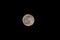 Super full moon with dark black background for placement in video, banner, shot in march 2022, Antwerp, Belgium