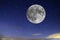 Super harvest moon. Super full moon with dark background. Europe. Horizontal Photography.