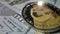 Super macro shot of Dogecoin Virtual Currency Commemorative. DOGE Coin Art Collection. Slow motion. Slowly fall and