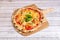 Super margherita pizza made with thin wheat flour dough with lots of cheese,