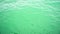 Super slow mo beautiful surface of green water for background