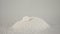 Super slow motion drop pieces of white sugar. Filmed on a high-speed camera 1000 fps.
