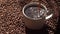 Super slow motion top view of coffee pour into cup from geyser coffee maker