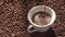 Super slow motion top view of coffee pour into cup from geyser coffee maker