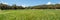 Super wide panorama of Picnic barbecua area in the center of the unique relict forest of National Park surrounded by young green