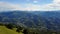 Superb 360Â° landscape on the Padana plain and Alps in summer time. Panorama from Linzone Mountain, Bergamo, Italy.