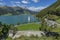 Superb aerial view of Lake Resia in Curon Venosta Graun, South Tyrol, Italy