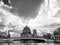 Superb black and white view of the Cathedral of Berlin, Germany and the Spree River against a dramatic sky during a river cruise