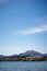 Superb image of a sailboat sailing the famous Wanaka lake on a sunny winter day, New Zealand