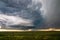 Supercell storm with dramatic dark clouds.