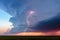 Supercell thunderstorm cumulonimbus cloud with lightning bolt