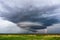 Supercell thunderstorm with lightning bolt.