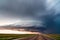 Supercell thunderstorm over a road