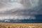 Supercell thunderstorm with wall cloud.