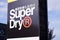 Superdry logo and text sign front of british shop branded clothing company store