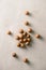 Superfood. Organic macadamia nut on stone background