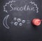 Superfoods and health or detox diet food concept, drawn in chalkboard on a chalk board ingredients smoothies, top view