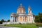 Superga basilica on Turin hills with flowerbed and clear blue sky in a sunny day in Italy