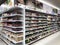 Supermarket aisle with shelfs full of a variety of products