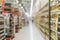 Supermarket blurred background oil bottle and seasoning sauce on shelves at grocery