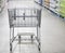 supermarket cart in warehouse aisle