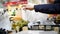 Supermarket - customer uses plastic package in fruit Department, defocused