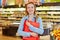 Supermarket employee with clipboard