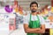 Supermarket employee portrait with crossed arms