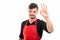 Supermarket employer showing ok or approval gesture
