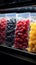 Supermarket shelf stocked with convenient plastic bags of frozen, flavorful berries