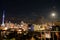 Supermoon lunar eclipse rise over Auckland skyline New Zealand