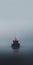 Supernatural Minimalist Photography: Tugboat In The Fog