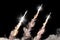 Supersonic missiles launch - modern strategic nuclear rocket weapons concept isolated on black background, military 3D