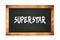 SUPERSTAR text written on wooden frame school blackboard