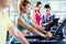 Supervision of sportive people training on treadmill