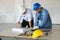 Supervisor foreman or Architect discuss with Technical Engineer