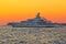 Superyacht on yellow sunset view