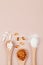 Supplements for health , vitamin D zinc and vitamin C powder in wooden spoons on beige background