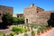 Supplier courtyard and gardens at the Nasrid Palace in Malaga castle