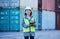 Supply chain, tablet and logistics with a woman shipping worker on a commercial container dock. Internet, stock and